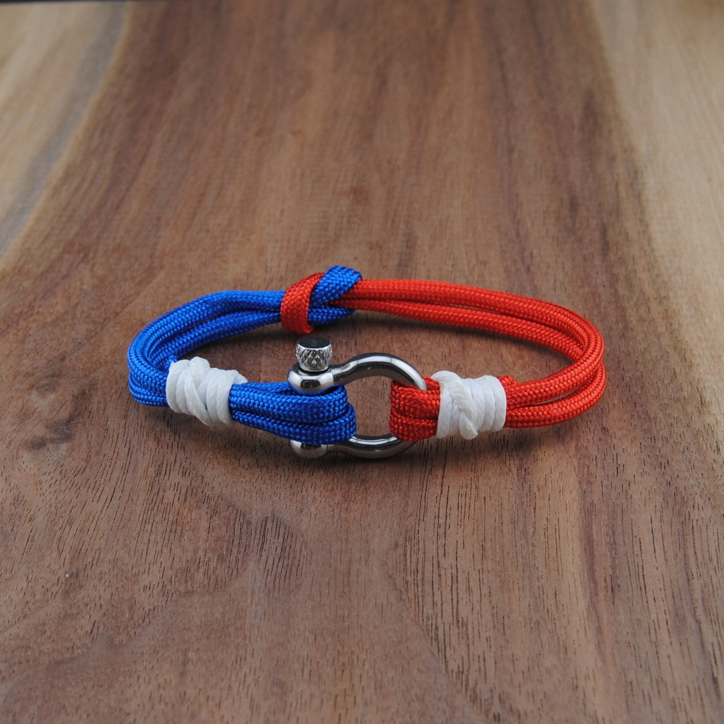 The Patriot Double Interlock - Red and Blue Paracord interlocked Bracelet with Polished D-Shackle w/ Crown