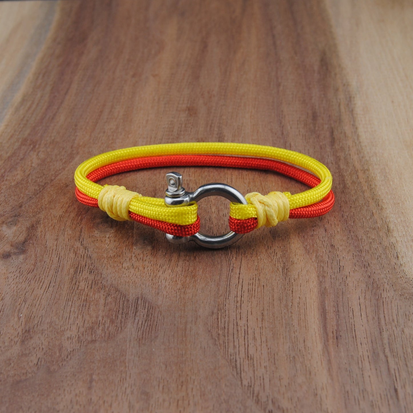 The Calgary Hockey Pride (Calgary Flames) - Red and Yellow Paracord Bracelet with Stainless D-Shackle