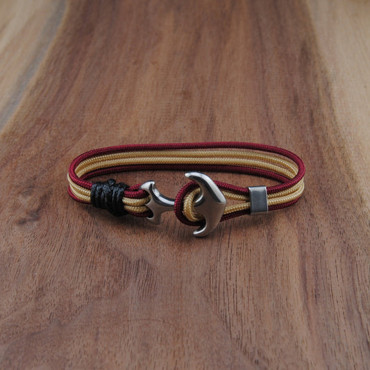 Bracelet with a unique clasp on a wooden surface