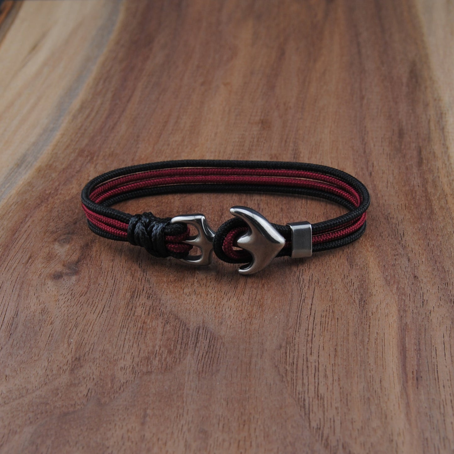 Bracelet with a clasp on a wooden surface