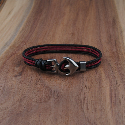 Bracelet with a clasp on a wooden surface