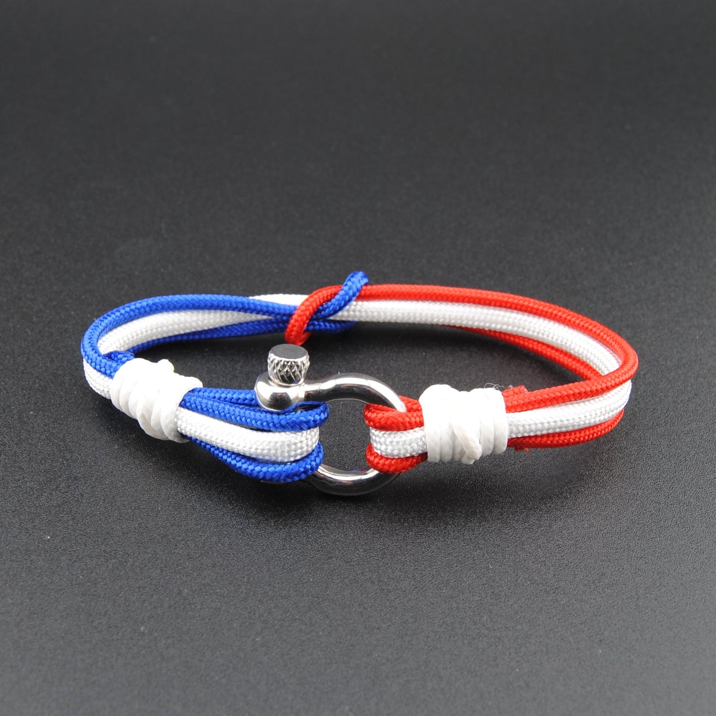 The Patriot Triple Interlock - Red and Blue Paracord interlocked with a white full stripe Bracelet with Polished D-Shackle w/ Crown