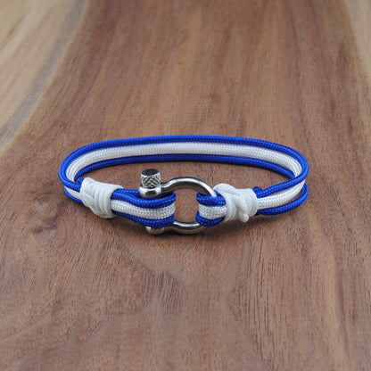 Blue and white bracelet on a wooden surface