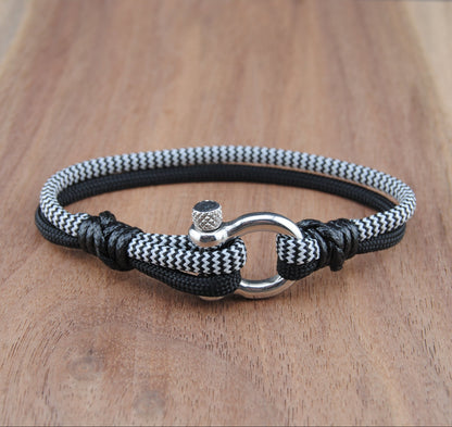 The Zebra Black Magic - Zebra and Black Paracord Bracelet with Polished Stainless D-Shackle w/ Crown